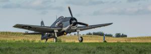 World War II Navy Hellcat Taking Off